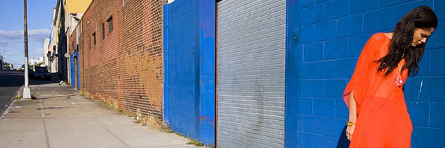 female in orange dress